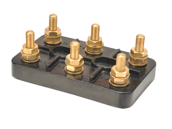 Motor terminal block with metal studs